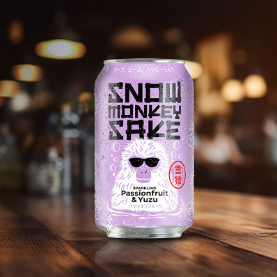 A can of Snow Monkey Sake - Passionfruit & Yuzu on a bar counter