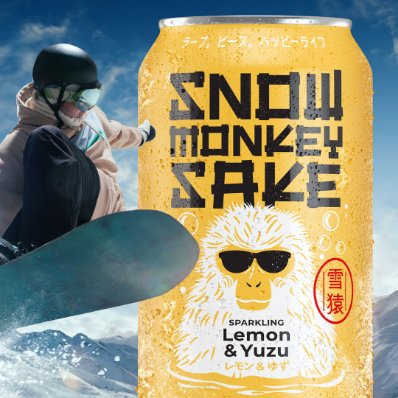 A snowboarder and a can of Snow Monkey Sake - Lemon & Yuzu